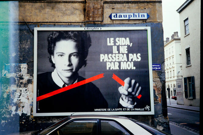 French AIDS awareness campaign, reading "AIDS stops with me" is seen in a street of Lyon (Central-Eastern France) 1987-1988. 