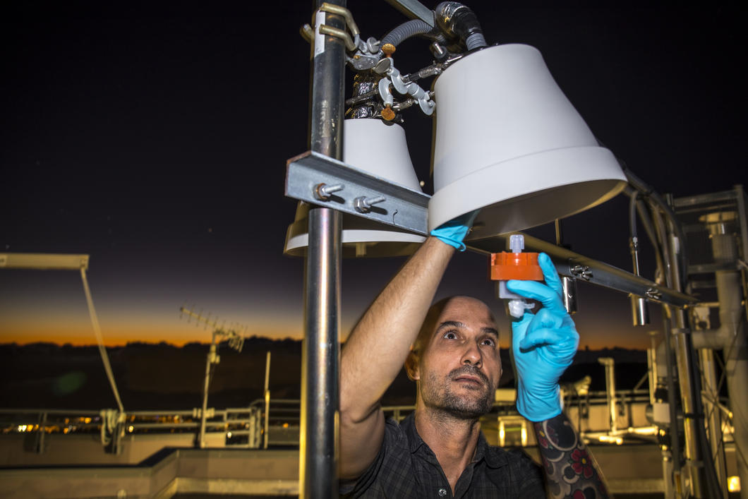 Engineer installing an atmospheric mercury detector