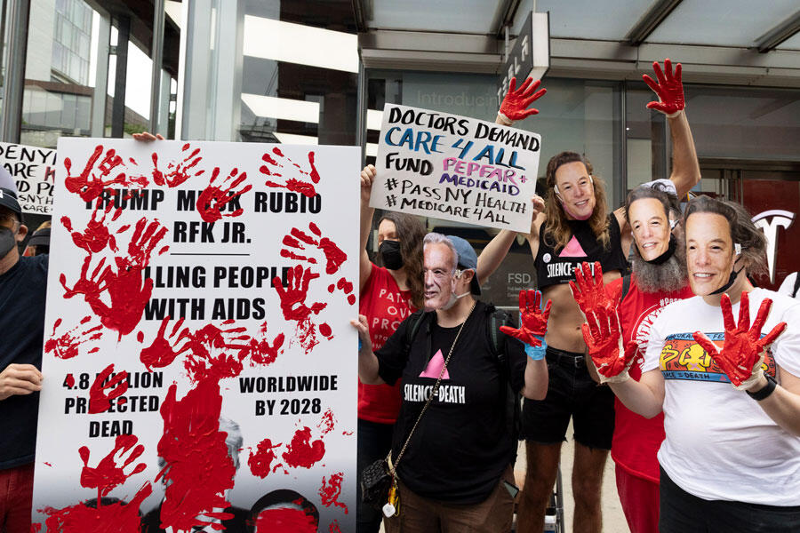 Outside of the Tesla showroom in Manhattan’s Meatpacking District demonstrators with Act Up NY (AIDS Coalition to Unleash Power,) Housing Works and community supporters 