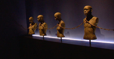 Memorial sculpture of enchained slaves.